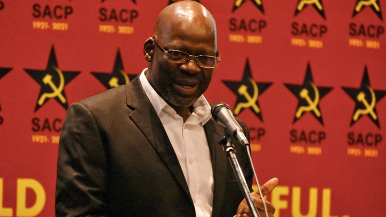 SACP General-Secretary Solly Mapaila speaking at an event.
