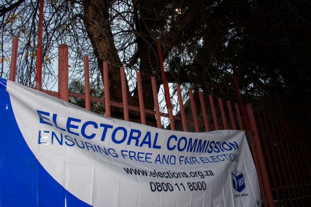 FILE | Electoral Commission (IEC) banner at a polling station.