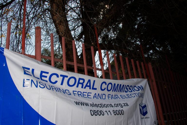 FILE | Electoral Commission (IEC) banner at a polling station.