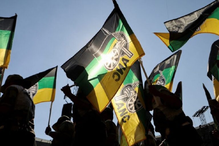 Supporters of the ANC wave party flags at a rally in Johannesburg, South Africa, May 25, 2024.